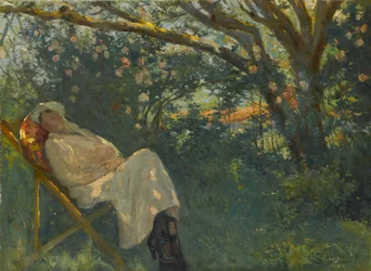 Femme en rose sur une chaise longue